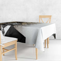White tablecloth with black-and-white MLK portrait graphic, draped over a dining table