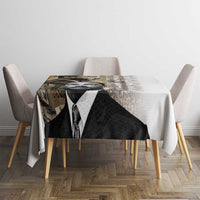 White tablecloth with black-and-white MLK portrait graphic, covers a dining table top