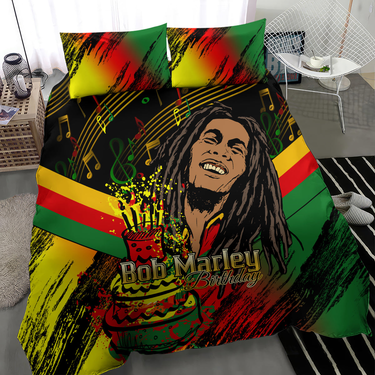 Close view of colorful duvet and pillows with Bob Marley Birthday portrait and cake graphic