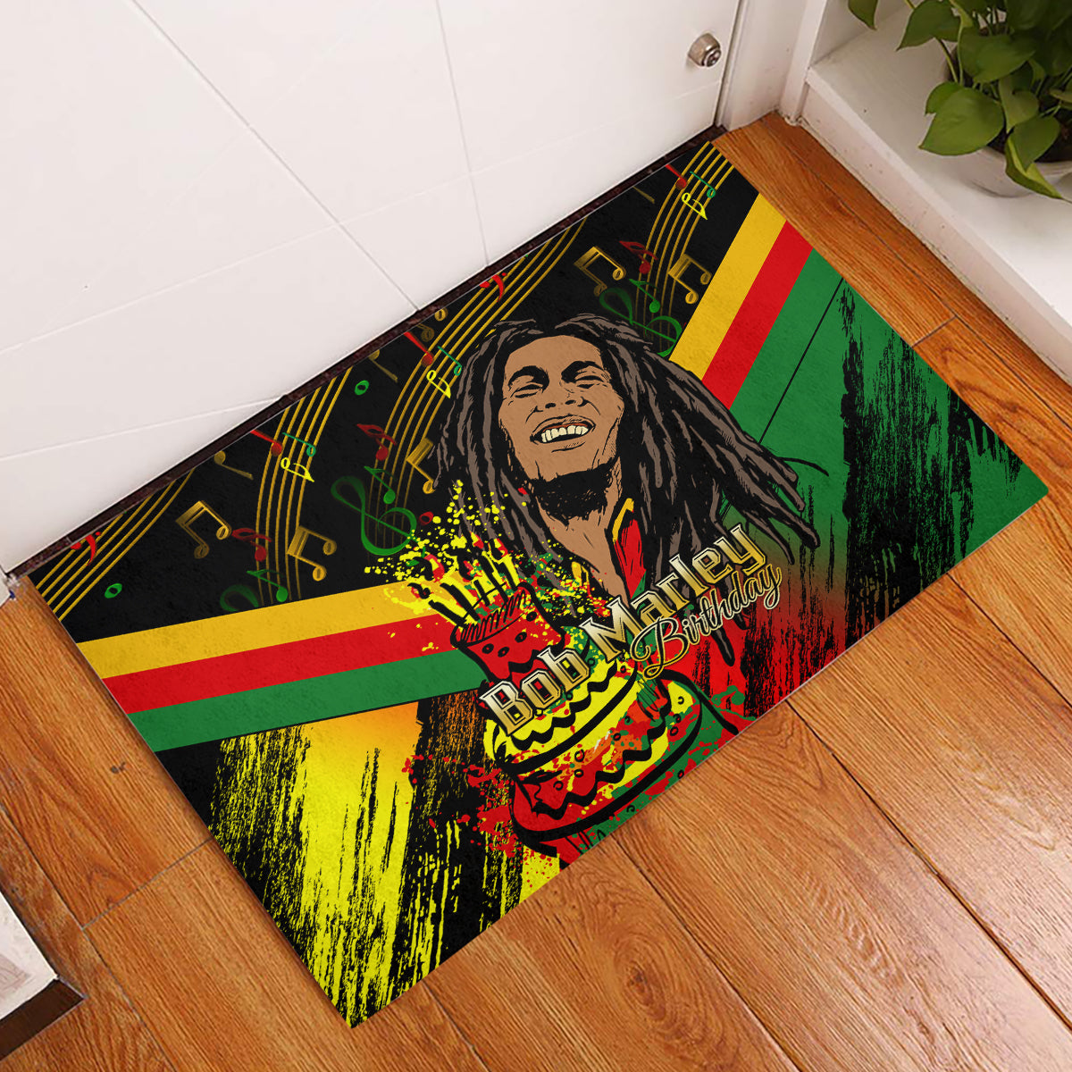 Black rubber doormat with Bob Marley portrait, reggae colors, and Birthday graphic