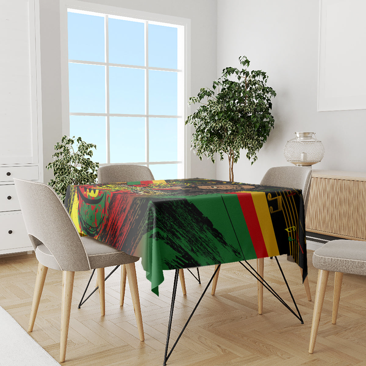 Reggae-themed Bob Marley birthday tablecloth in dark print with red, green, and yellow blocks