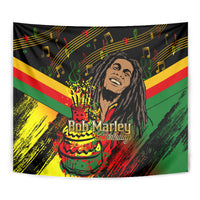 Black reggae tapestry close-up: Bob Marley portrait with birthday cake and notes