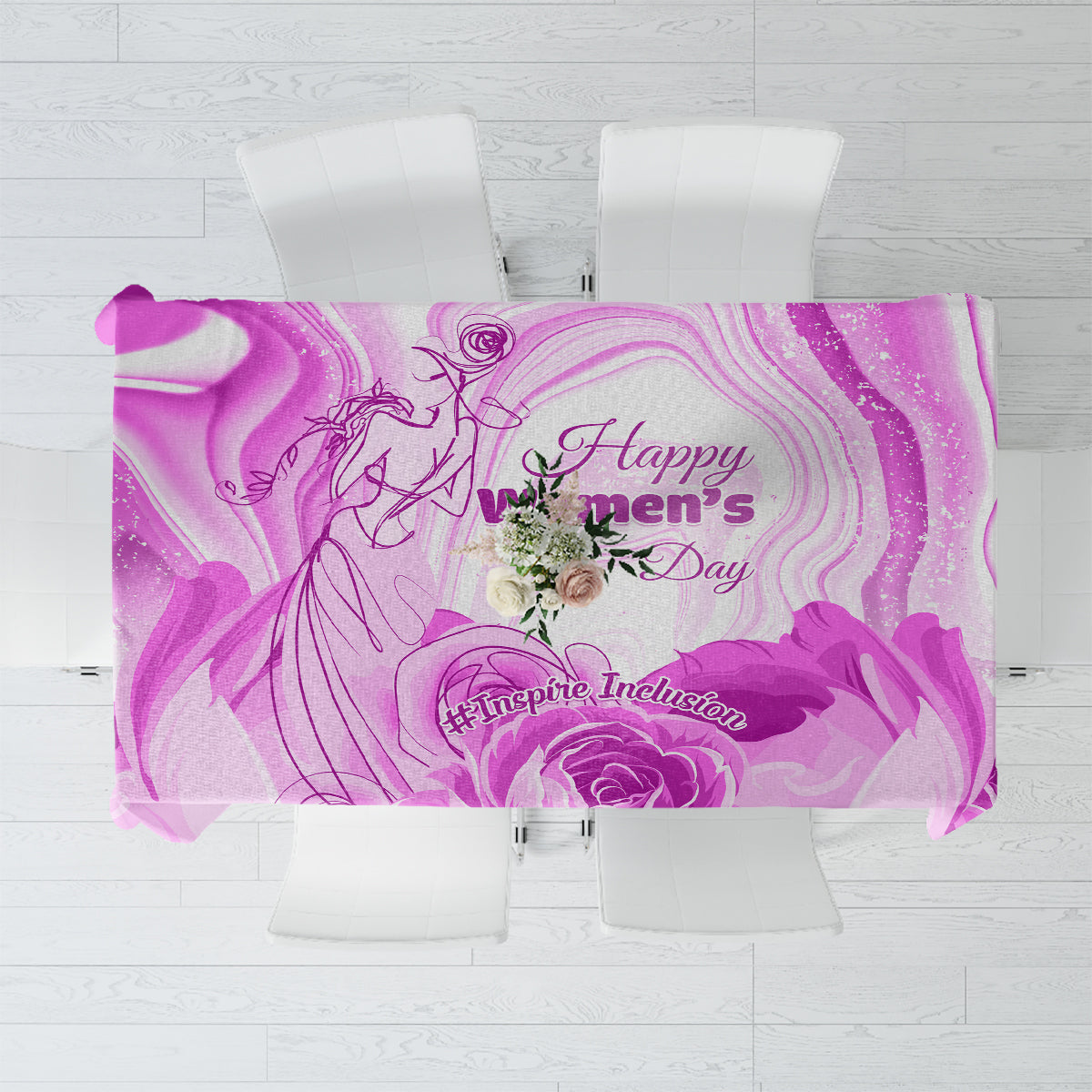 Purple tablecloth with floral-and-swirls print, draped over a table top
