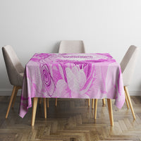 Purple floral swirls tablecloth on a dining table, shown front view with chairs