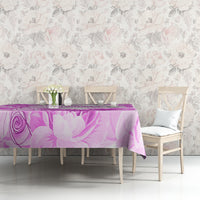 Purple rose-and-tulip patterned tablecloth covering a rectangular table