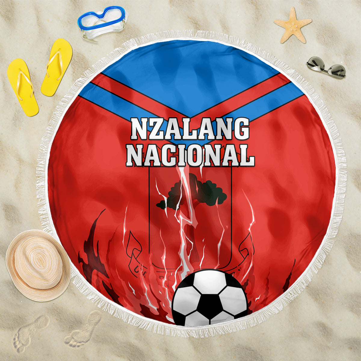Red 150cm round beach blanket with “NZALANG NACIONAL” print, blue stripe and soccer ball