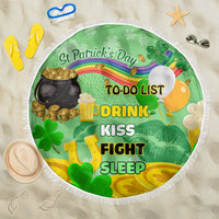 Round green beach blanket with white fringe, shamrock and to-do list graphic