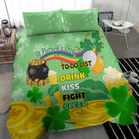 Green St. Patrick's Day duvet with shamrock graphics and “Drink Kiss Fight Sleep” text