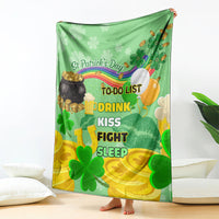 Green St. Patrick's Day blanket held upright, featuring clovers, rainbow, and TO-DO list