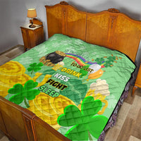 St. Patrick’s Day quilt on bed, green and yellow clover pattern with to-do list