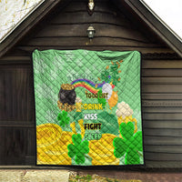 St. Patrick’s Day quilt hanging outdoors with clovers and to-do list on green