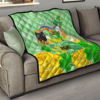 St. Patrick’s Day quilt on gray couch with shamrocks and to-do list design