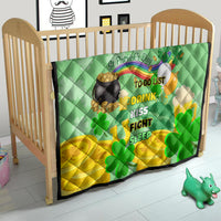 St. Patrick’s Day quilt on toddler bed with clovers and to-do list lettering