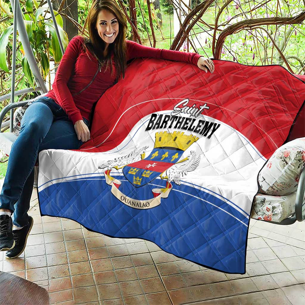 Red, white, and blue quilt with Saint Barthelemy crest, quilted diamonds, and blue bottom