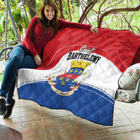 Red, white, and blue quilt with Saint Barthelemy crest, quilted diamonds, and blue bottom