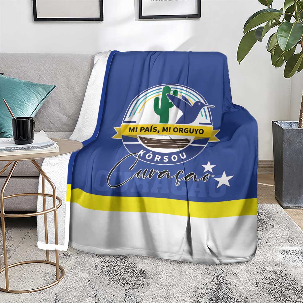 Curacao blanket with blue, white, and yellow flag design and coat of arms print