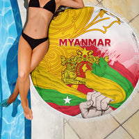 Round beach blanket with fringe edge, Myanmar flag-style graphic by the pool