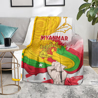 Myanmar flag blanket with MYANMAR text, clenched-fist image, bright yellow green red stripes on white