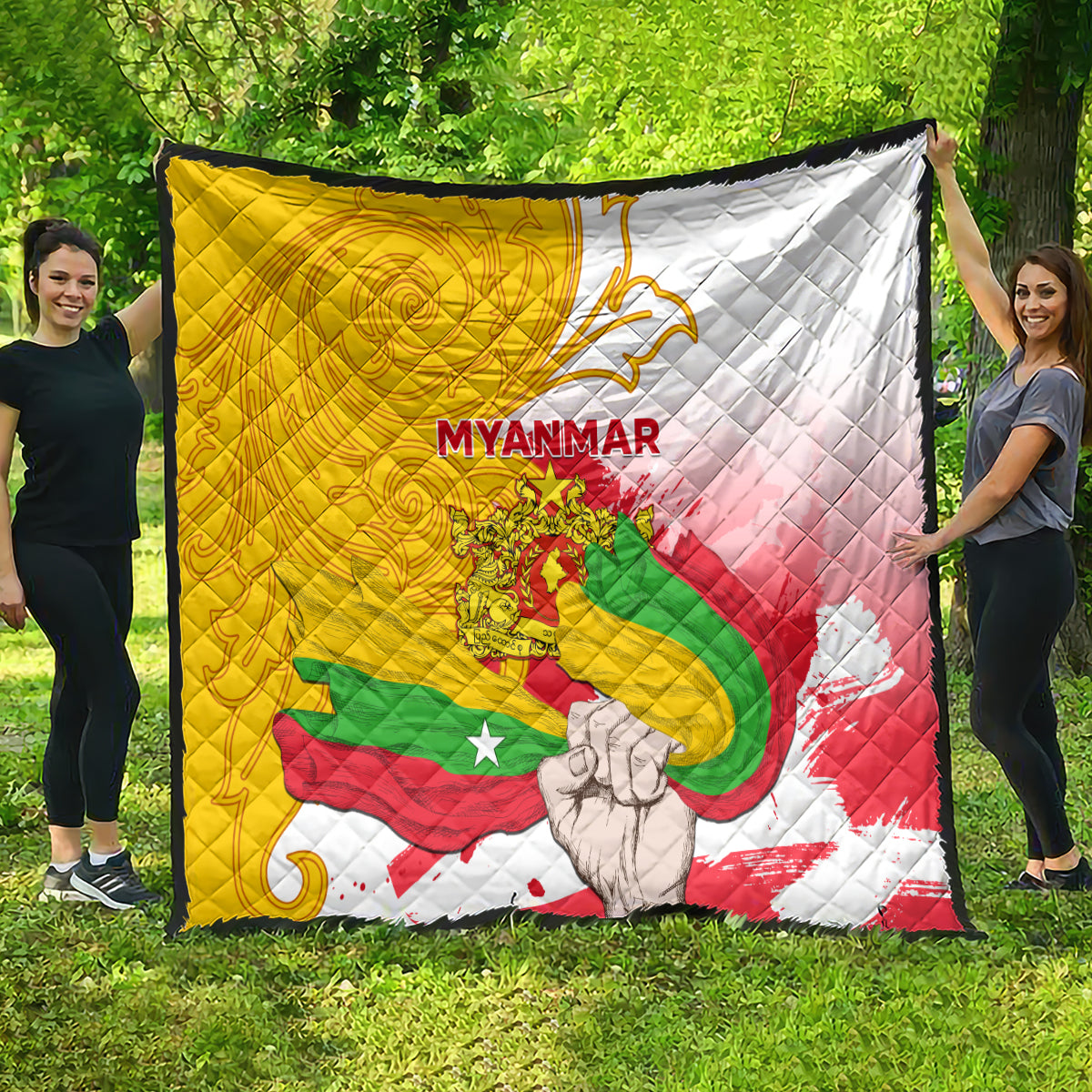 Quilted throw quilt featuring Myanmar flag artwork with yellow, red, green, and white