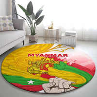 Round carpet with Myanmar flag print, 'MYANMAR' title, and fist and emblem