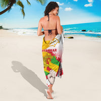 Myanmar flag print sarong, draped around legs with red and green brush strokes