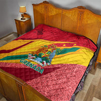 Grenada flag quilt on a bed, red yellow green colors with glittery red trim