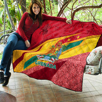 Grenada flag quilt held outdoors, red yellow green design with glittery red hem