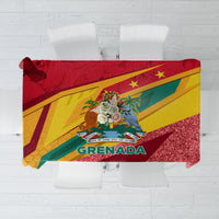 Red tablecloth with Grenada crest, yellow ribbon stripe, and glitter-speckled finish