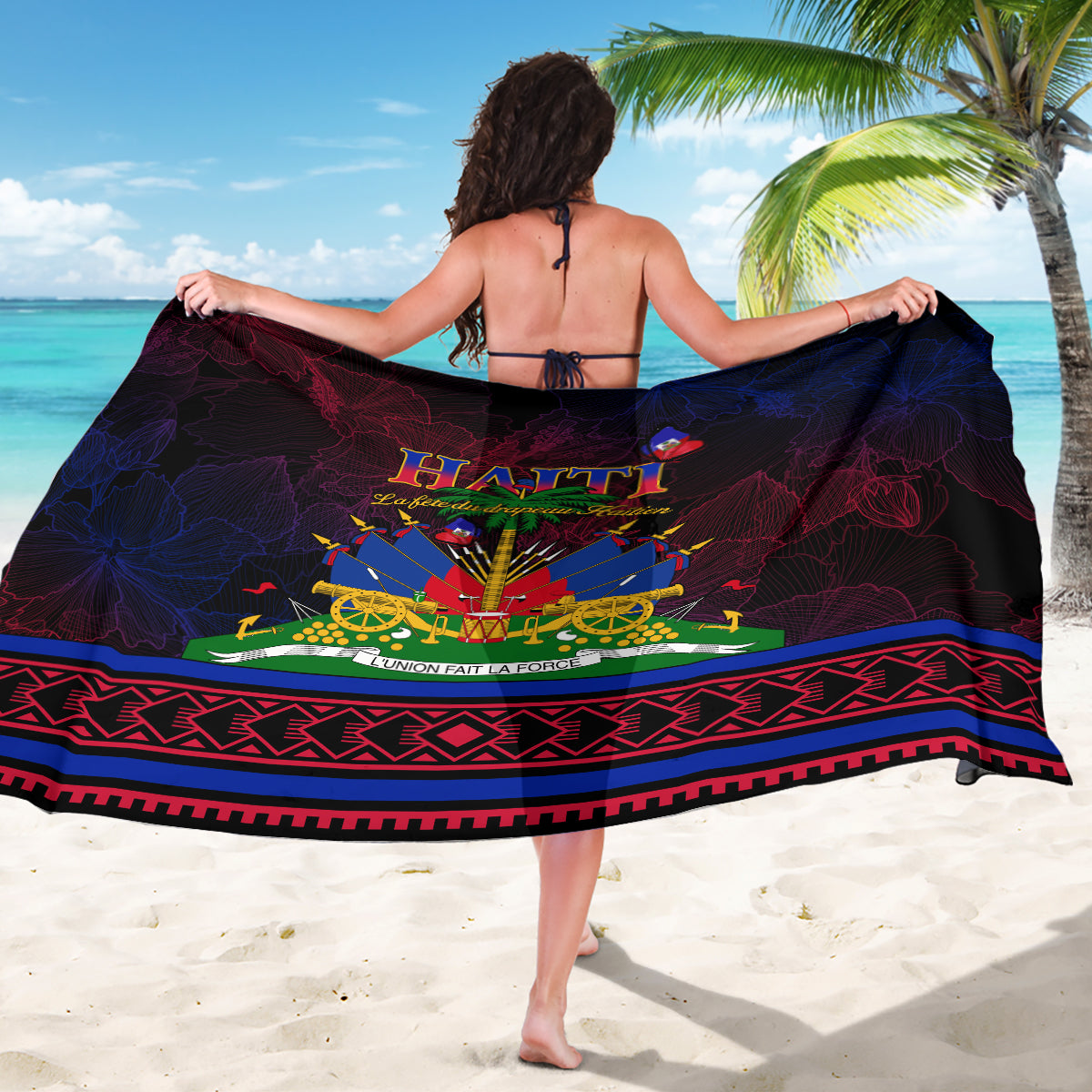 Haitian flag day sarong draped on back, dark navy/black with large Haiti-inspired graphic border