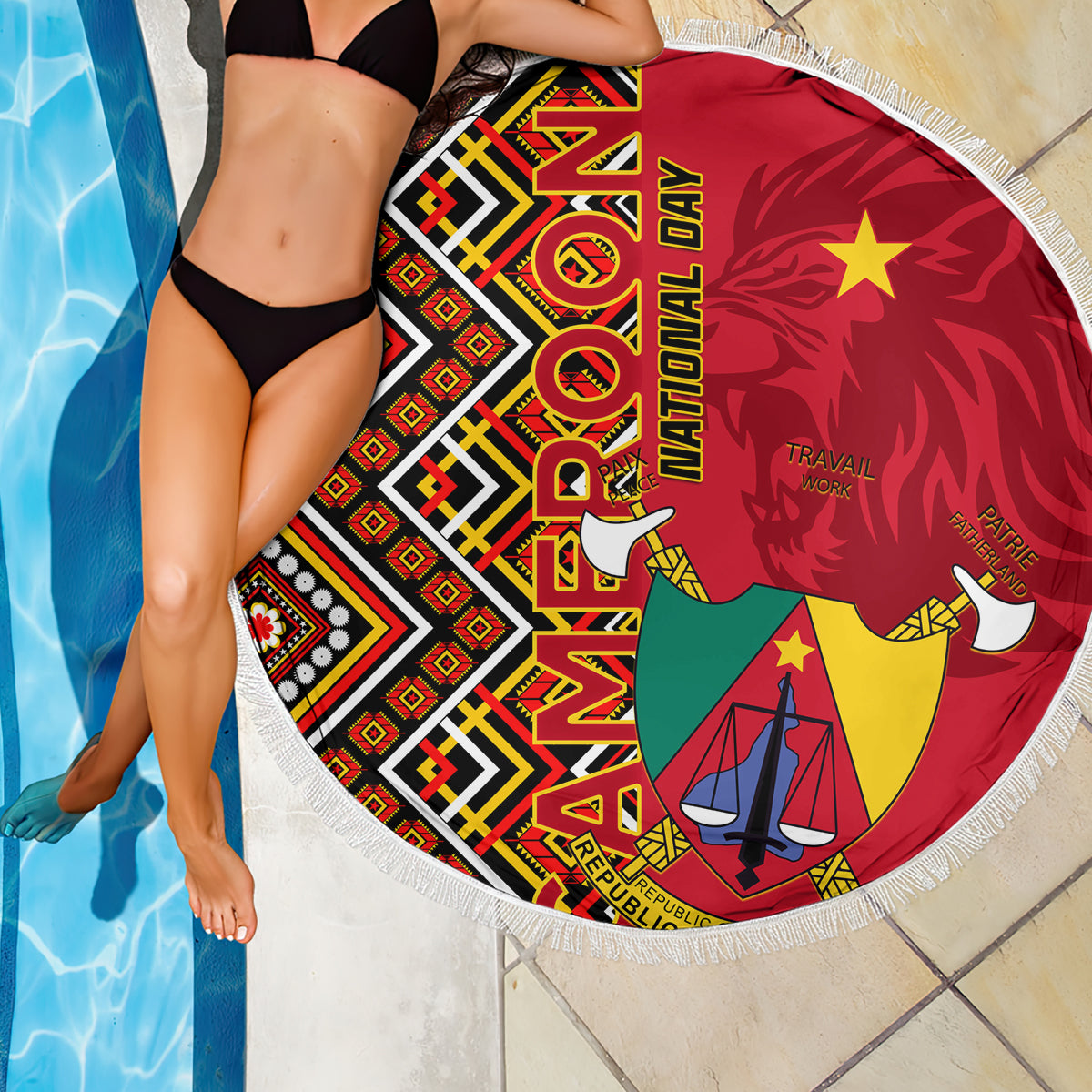 Round fringed beach blanket corner with Cameroon coat-of-arms, red Ankara print and tassel fringe