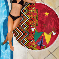Round fringed beach blanket corner with Cameroon coat-of-arms, red Ankara print and tassel fringe