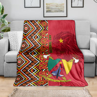 Cameroon national day blanket with red geometric Ankara pattern and coat of arms