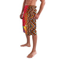 Knee-length sarong-style skirt with orange, red, and black zigzag Ankara pattern and crest