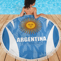 Round Argentina blue and white beach blanket with central sun graphic and fringed border