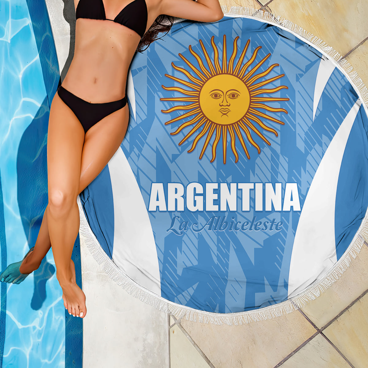 Round Argentina beach blanket, blue and white with sun face graphic and white fringe