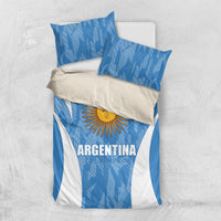 Blue and white Argentina bedding set with sun emblem, flag stripes, and two pillowcases
