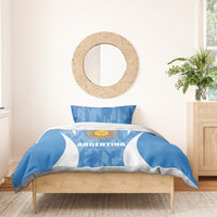 Blue Argentina bedding set with sun emblem and white flag stripes on duvet cover and pillows
