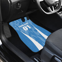 Blue car floor mat in passenger seat area with white stripes and “YOUR TEXT 01”