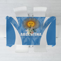 Blue tablecloth with Argentina sun emblem and 'ARGENTINA' lettering, symmetrical white panels.