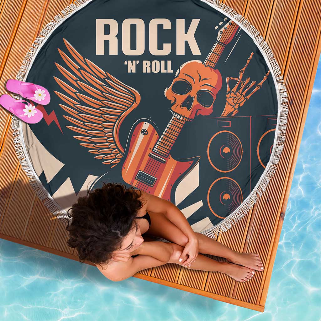 Round beach blanket with white fringe, rock guitar skull and speakers graphic