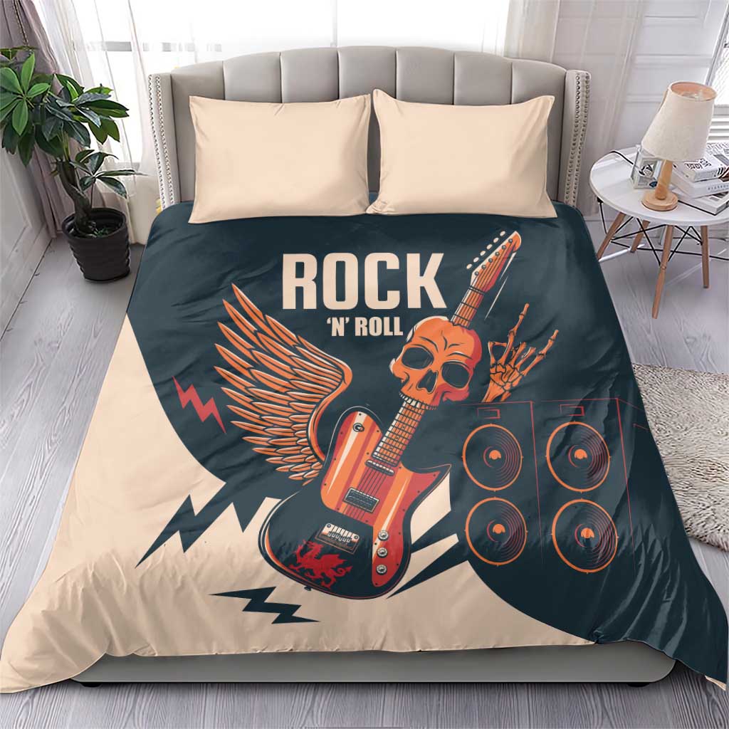 Beige & dark teal rock-themed bedding set with skull guitar, wings, speakers; two pillows