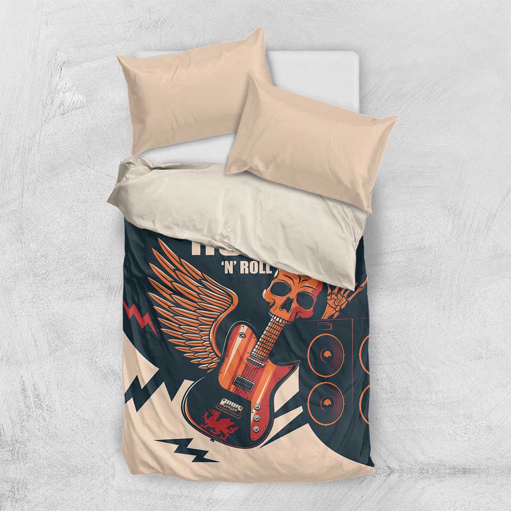 Top view bedding set with skull guitar artwork on beige and dark teal; two pillowcases
