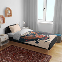 Rock-themed bedding set on bed with skull guitar print across beige and dark teal duvet