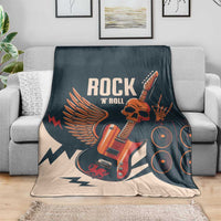 Rock skull guitar blanket draped on sofa, dark teal and beige with guitar and amp print