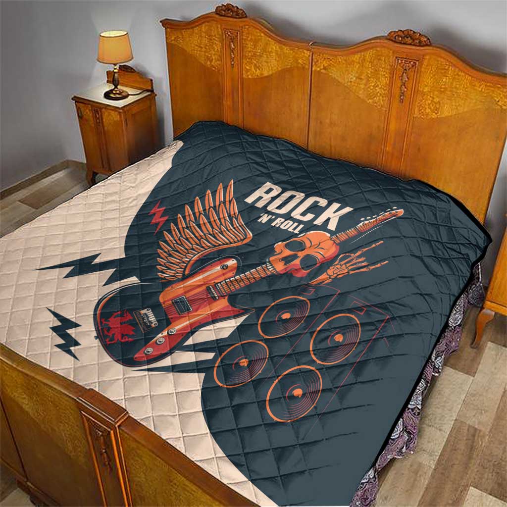 Rock and Roll skull guitar quilt on bed, dark teal with white lightning and guitar print
