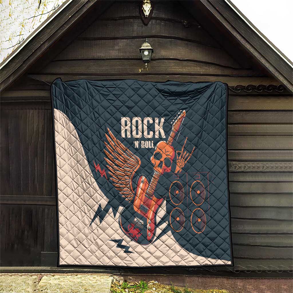 Rock and Roll skull guitar quilt hanging in doorway, dark teal with white lightning design