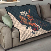 Rock and Roll skull guitar quilt draped on sofa, dark teal with white lightning and skull art