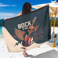 Sarong with oversized guitar and skull rock graphic, dark fabric with beige winged design