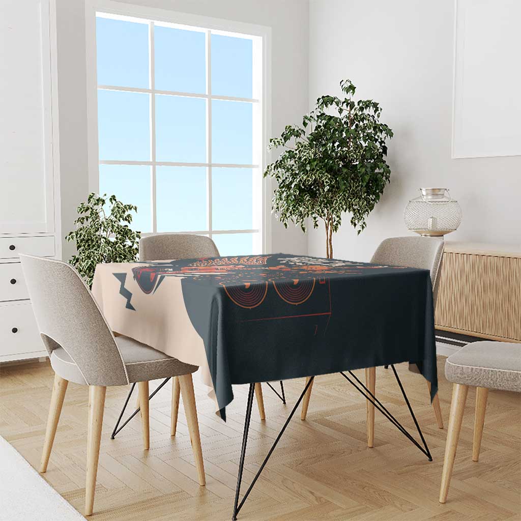 Skull guitar tablecloth on dining table, dark teal and beige with rock graphic