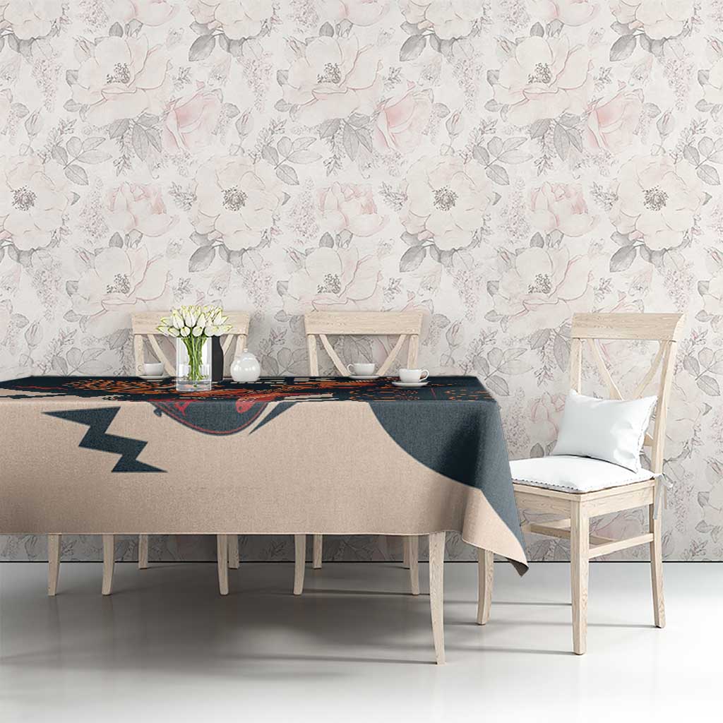 Skull guitar tablecloth on long dining table, dark teal and beige rock design